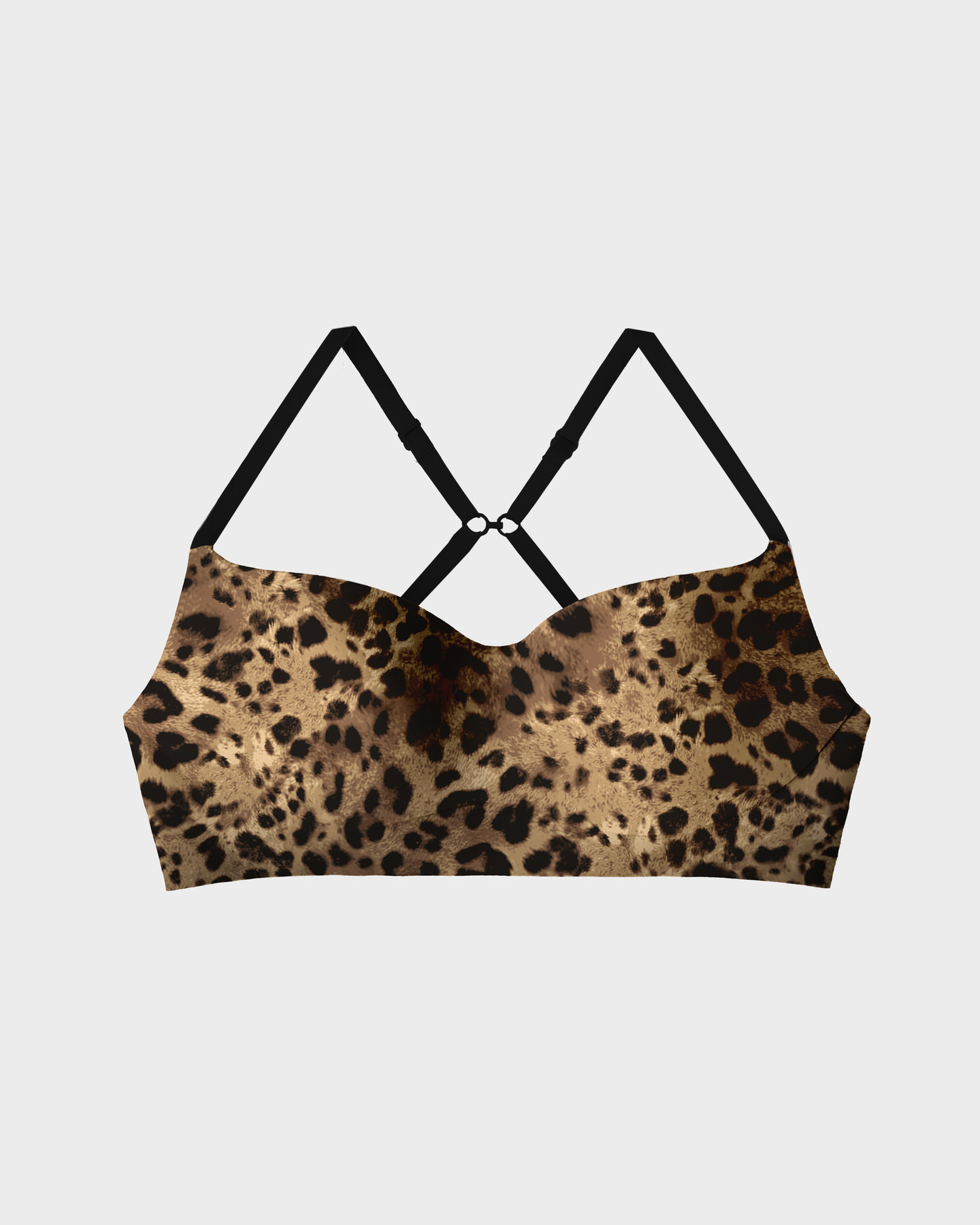 Leopard print sports bra with black straps on a white background.