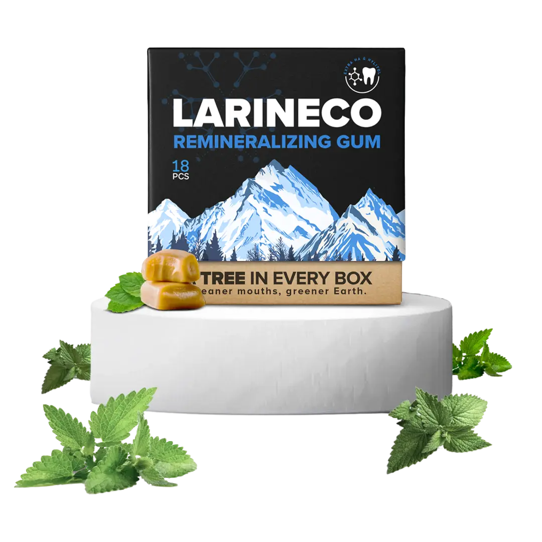 Box of LARINECO gum with mountains, mint leaves, and caramel pieces.