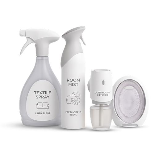 A collection of four home fragrance products, including a textile spray, room mist, and continuous diffuser.