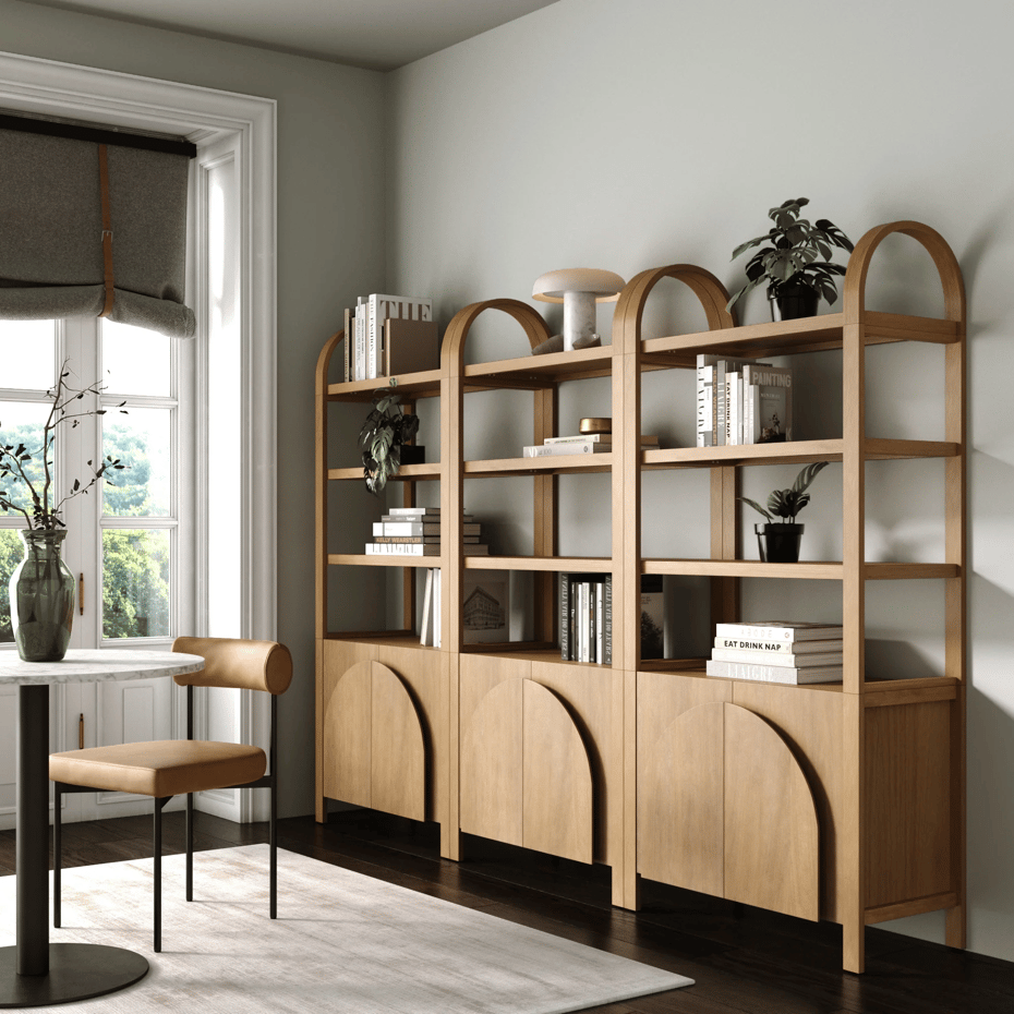 a room with a bookcase and a table