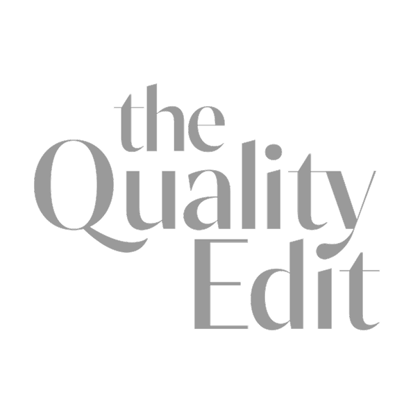 Gray text logo saying 'the Quality Edit' on a white background.