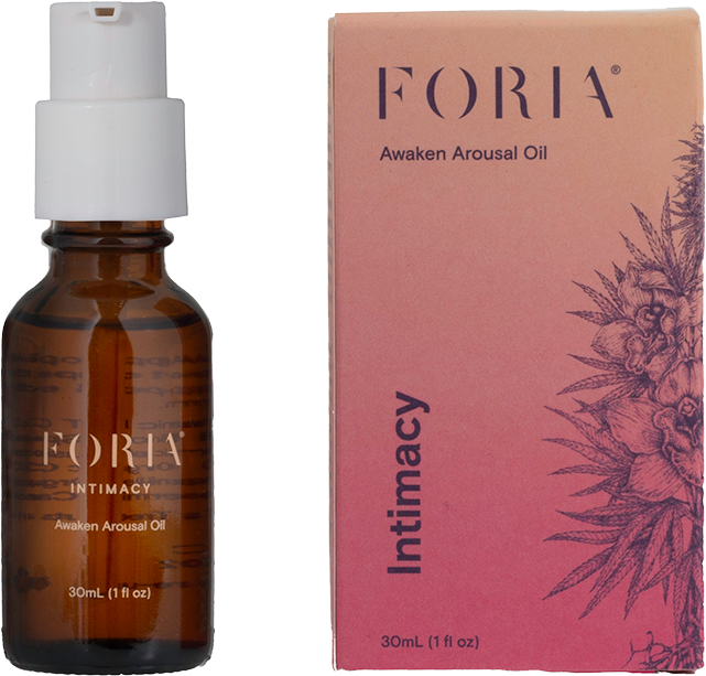 Brown bottle and pink box labeled 'Foria Awaken Arousal Oil.'