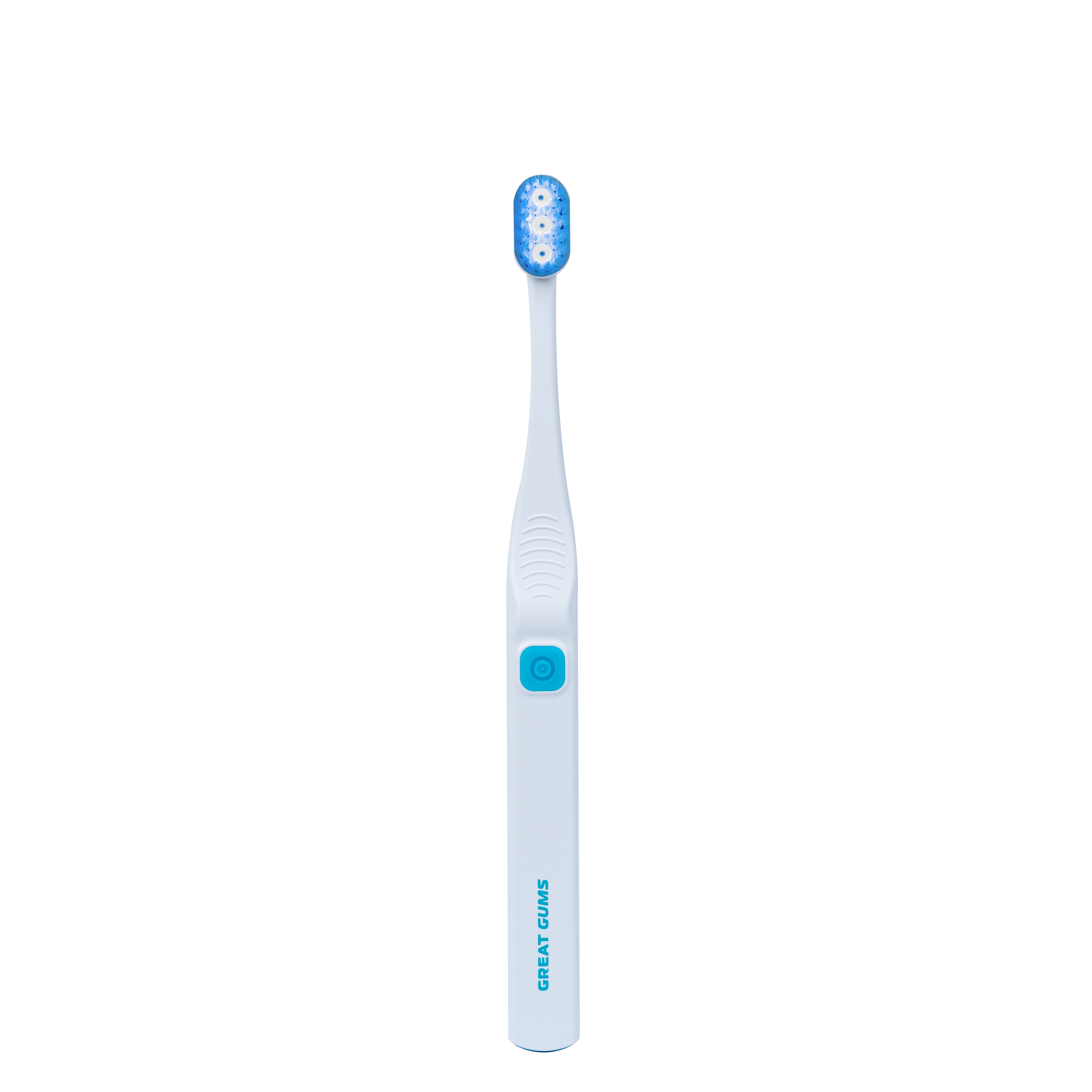 Electric toothbrush with blue bristles and a white handle on a green background.