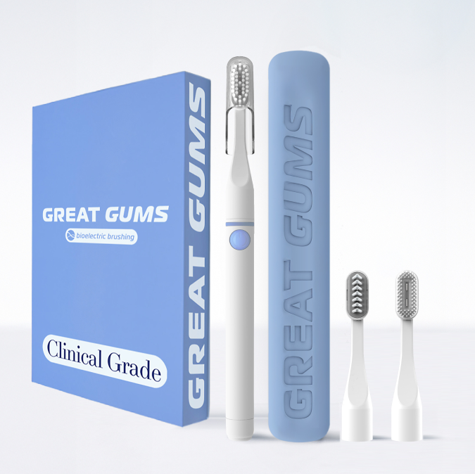 Electric toothbrush set with three brush heads and a blue case, labeled 'Great Gums'.