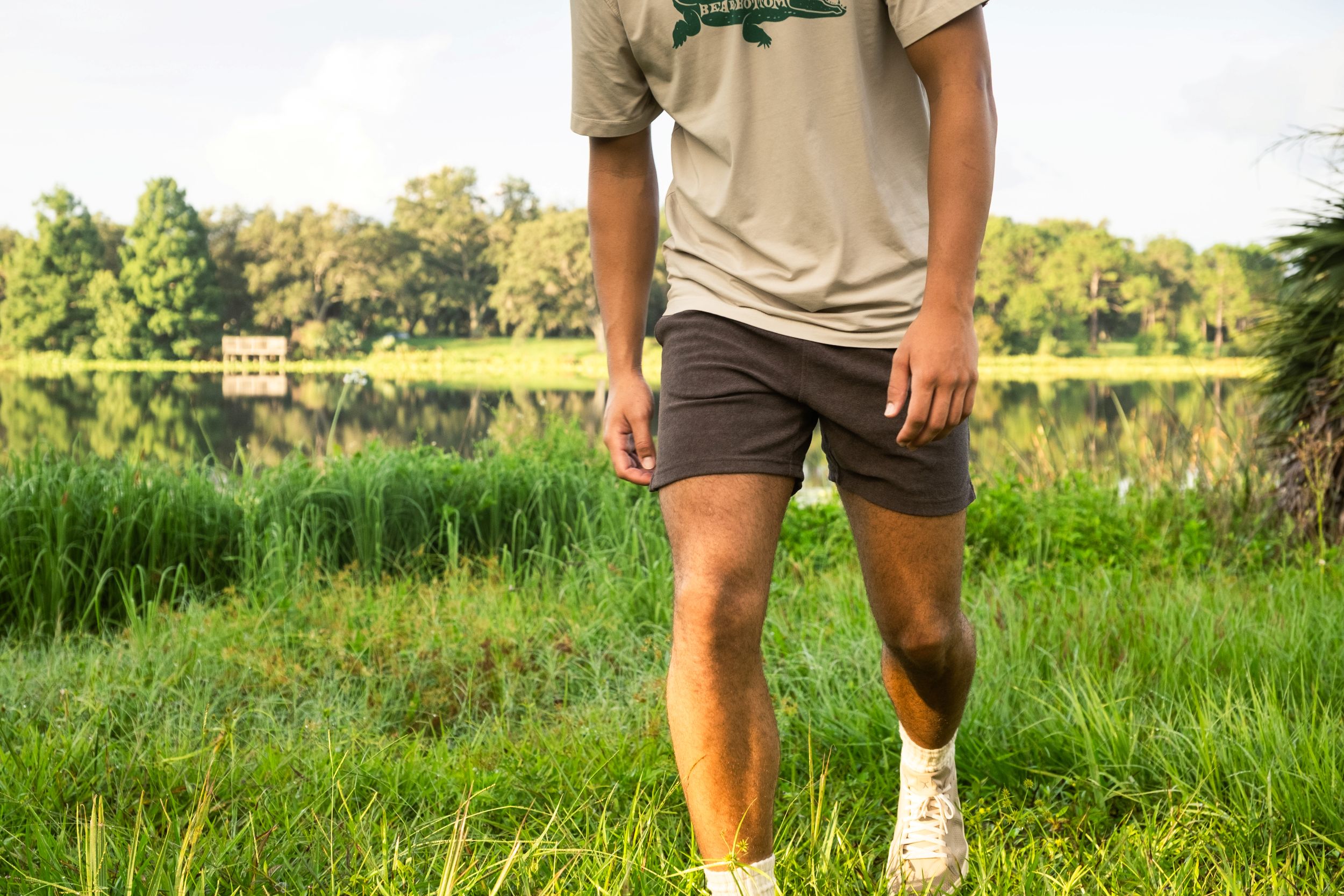 Man in Coastal Terry  Short walking through tall grass