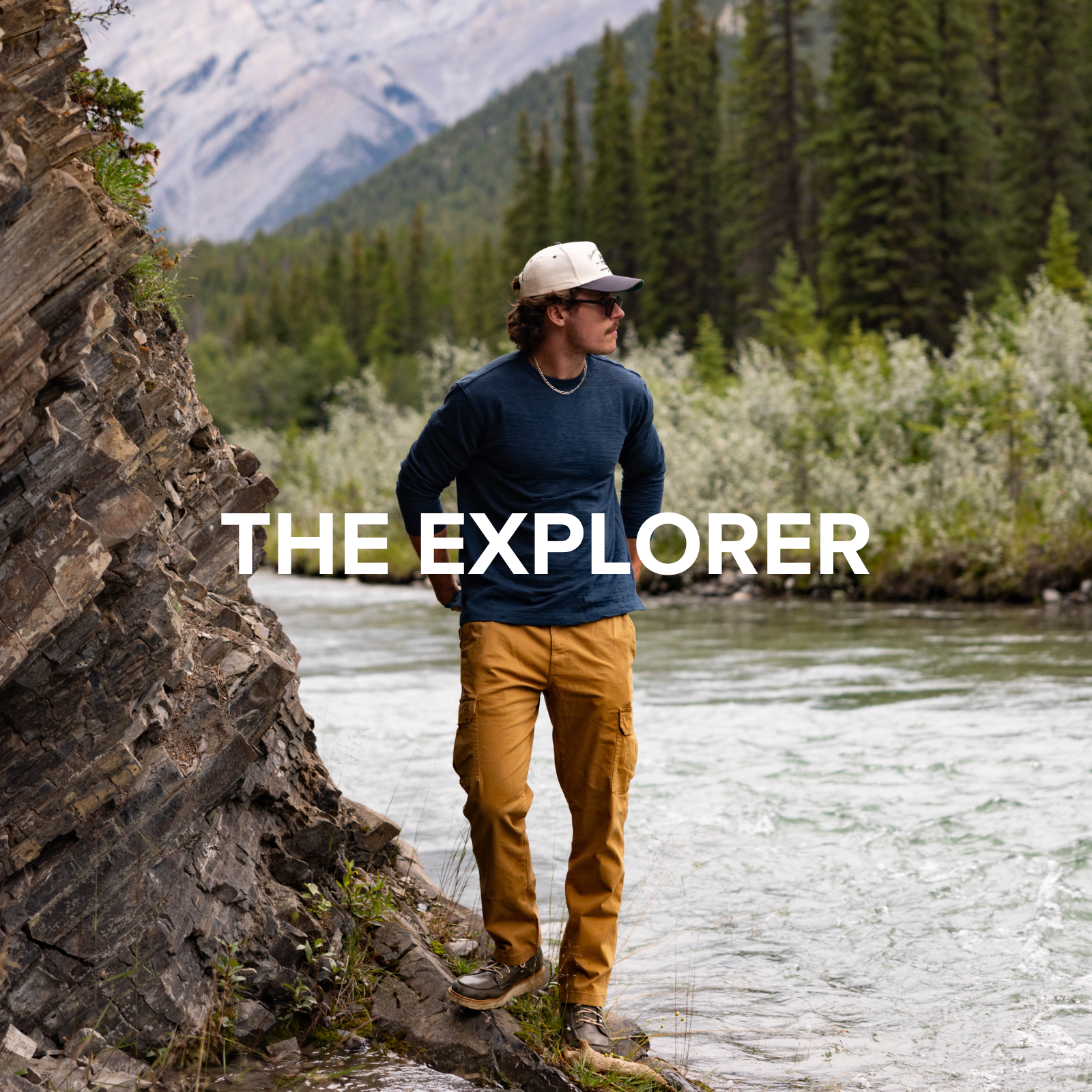 Man in Thermal Knit Crew Navy and Stretch Cargo Pant in Military Green