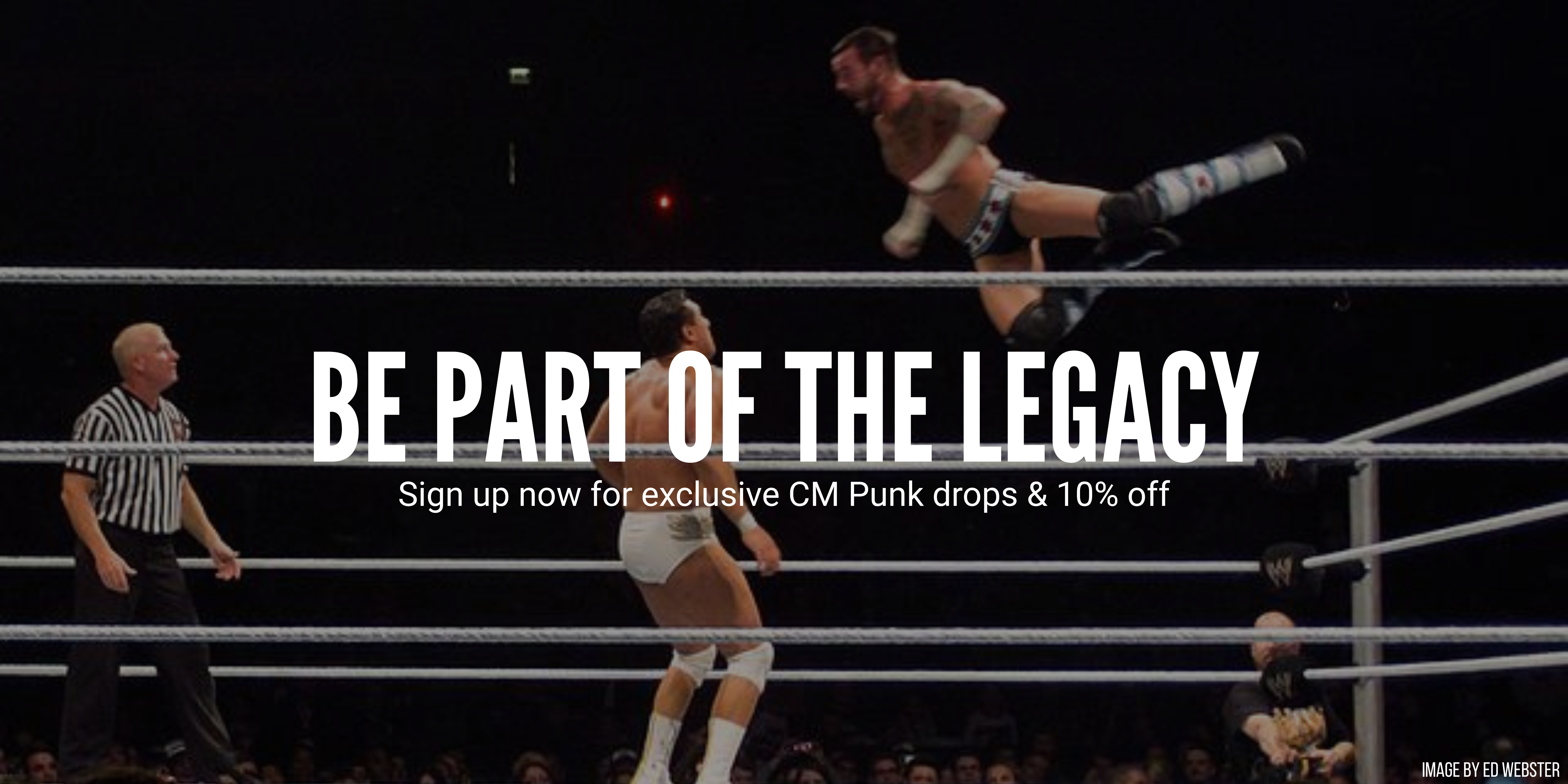 Wrestler jumping off ropes towards opponent in a ring, with promotional text overlay.