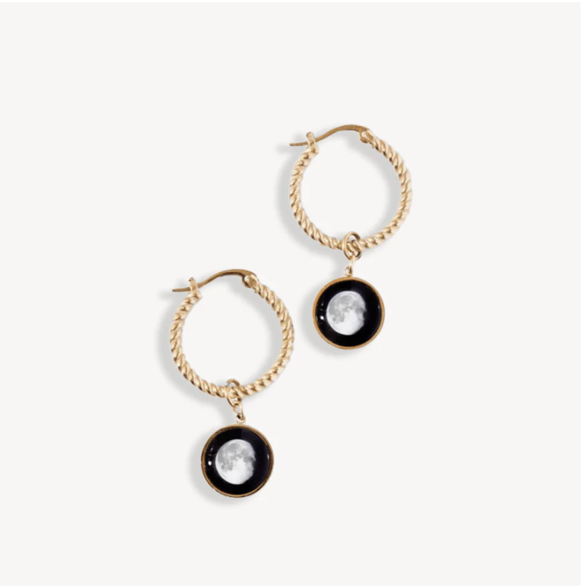 Gold hoop earrings with moon phase pendants on a white background.