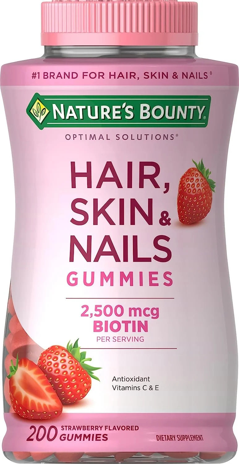 A bottle of Nature's Bounty Hair, Skin & Nails Gummies, strawberry flavored, against a white background.