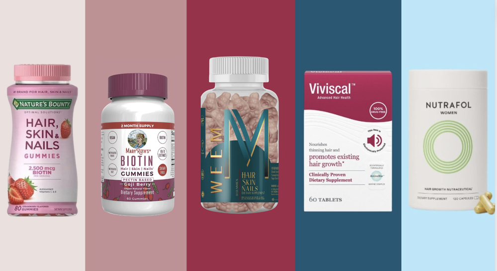A row of five different bottles of hair, skin, and nail dietary supplements against a multi-colored background.