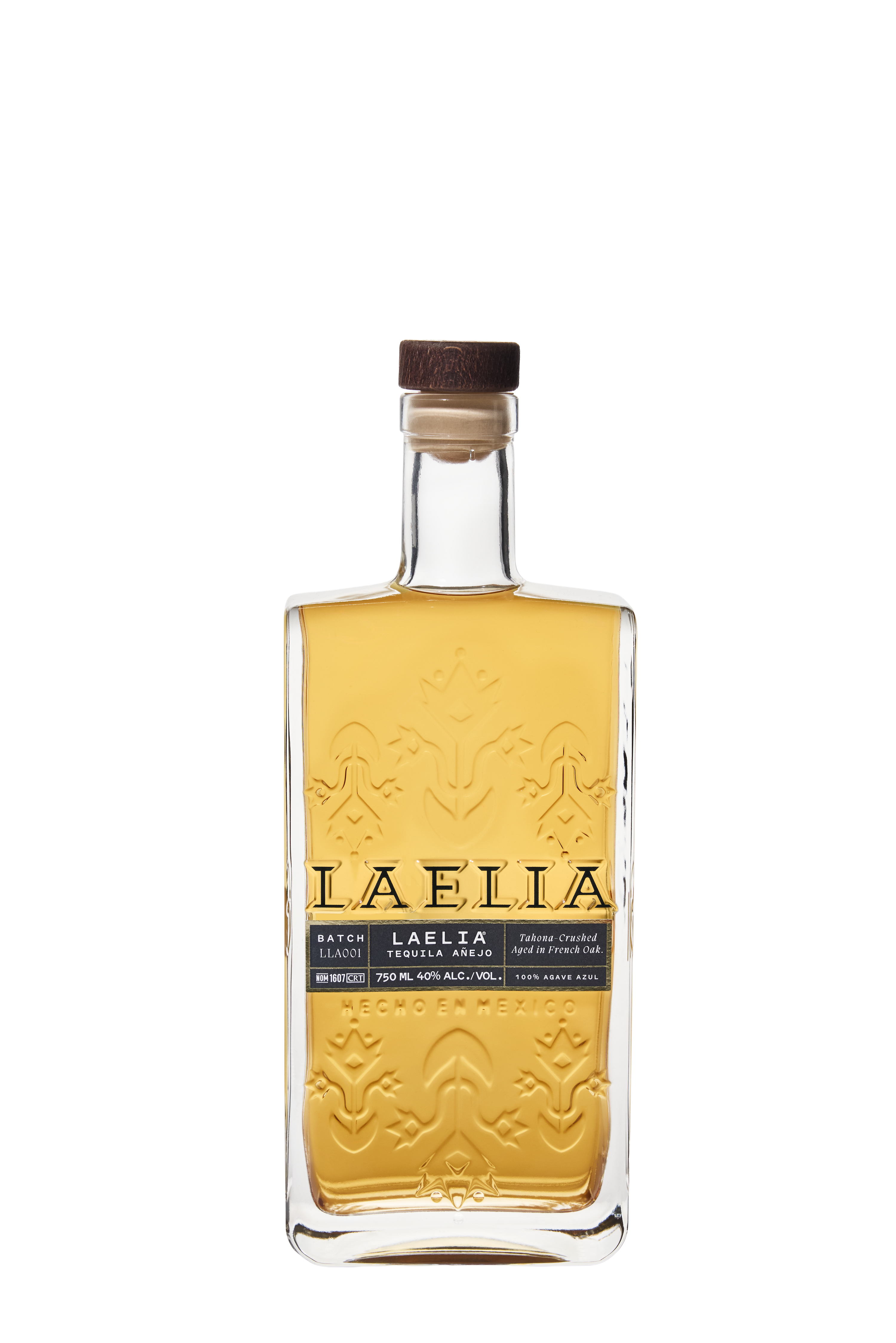 A bottle of Laelia Tequila Añejo with embossed design and dark cap.