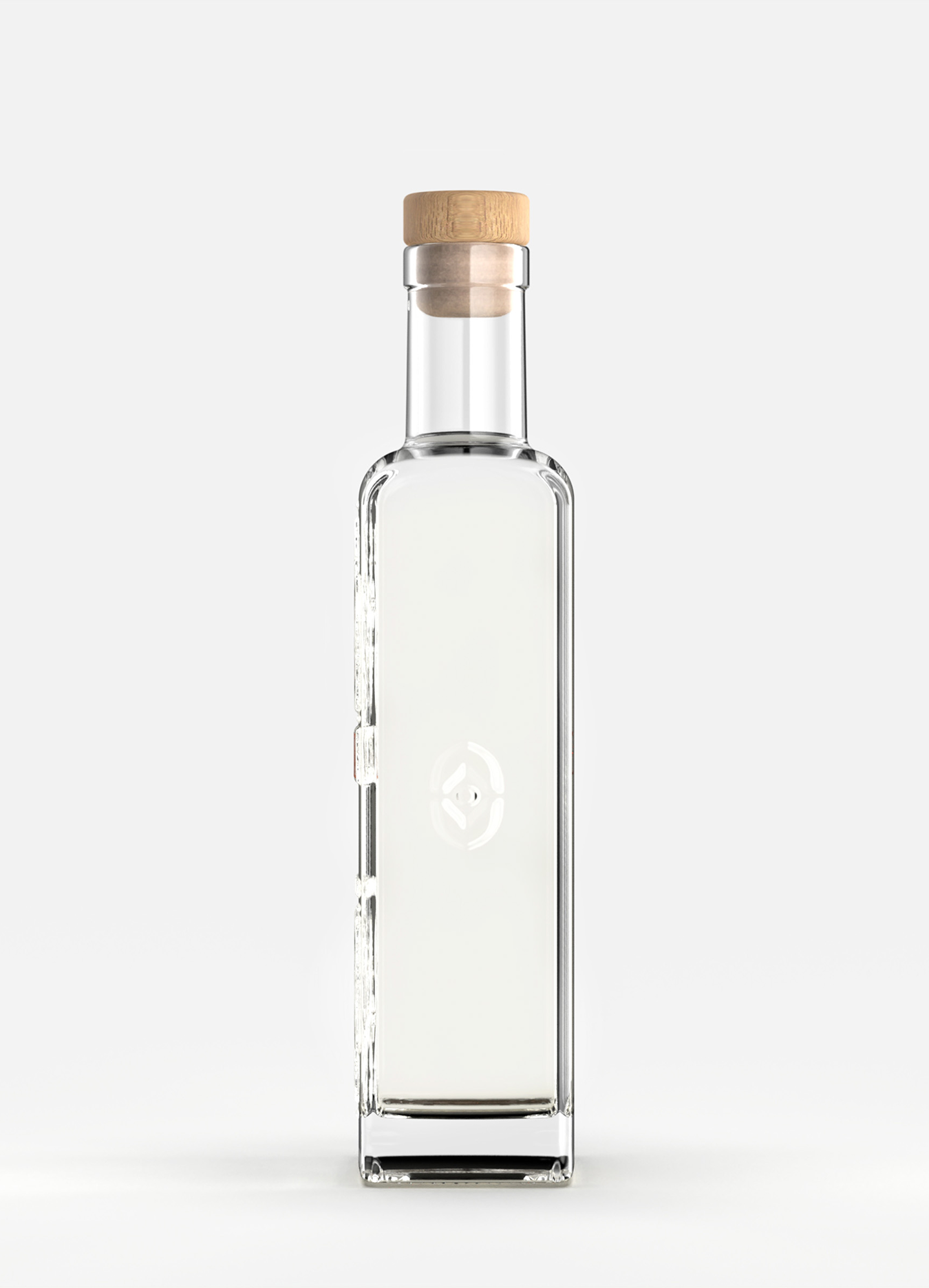 Clear glass bottle with wooden cork on a white background.