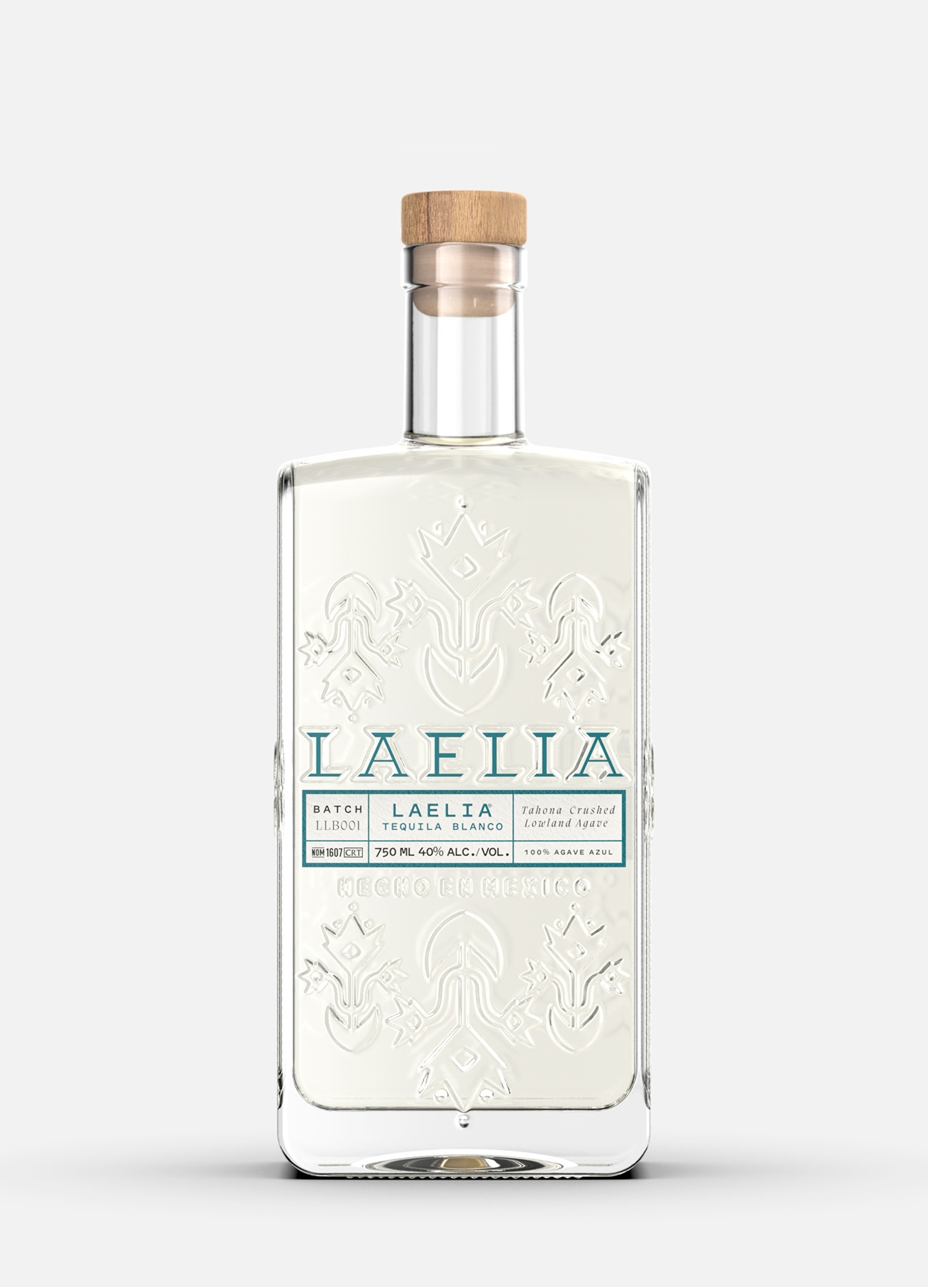 Clear glass bottle of Laelia Tequila Blanco with wooden cap.