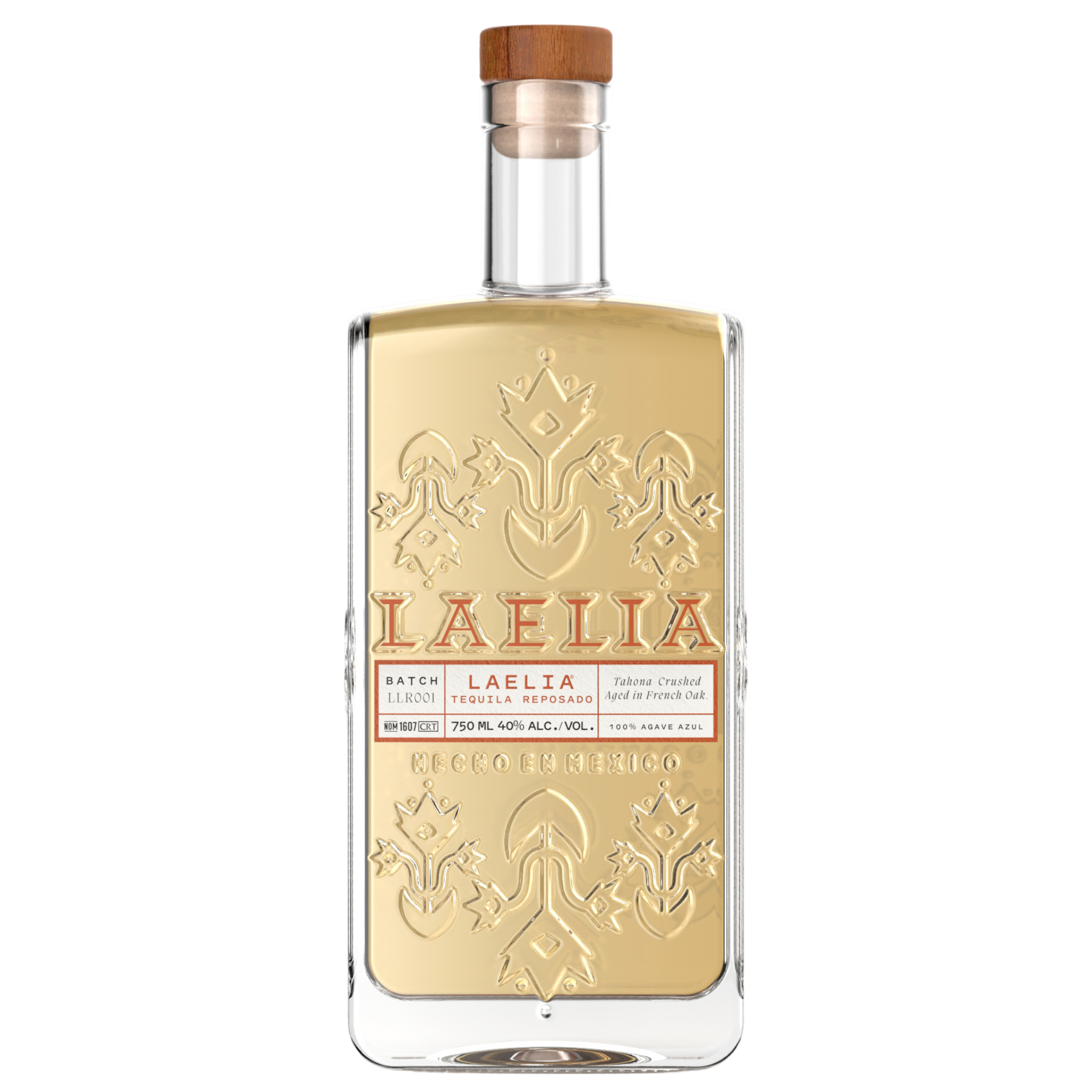 Clear glass bottle of Laelia tequila with embossed design and wooden cap.