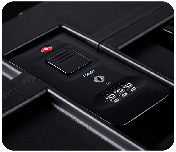 Black suitcase lock with TSA007 code and keyhole.