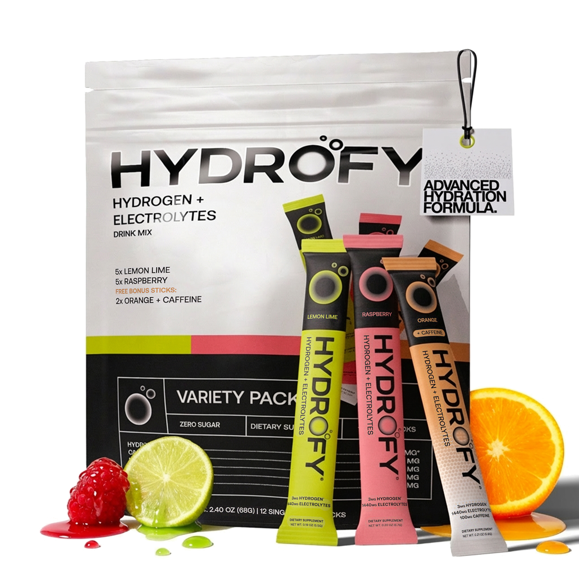 A variety pack of Hydrofy drink mix with single-serving sticks and fresh raspberry, lime, and orange.
