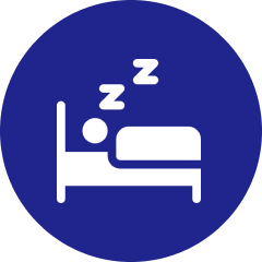 A blue circular icon showing a white silhouette of a person sleeping in a bed.