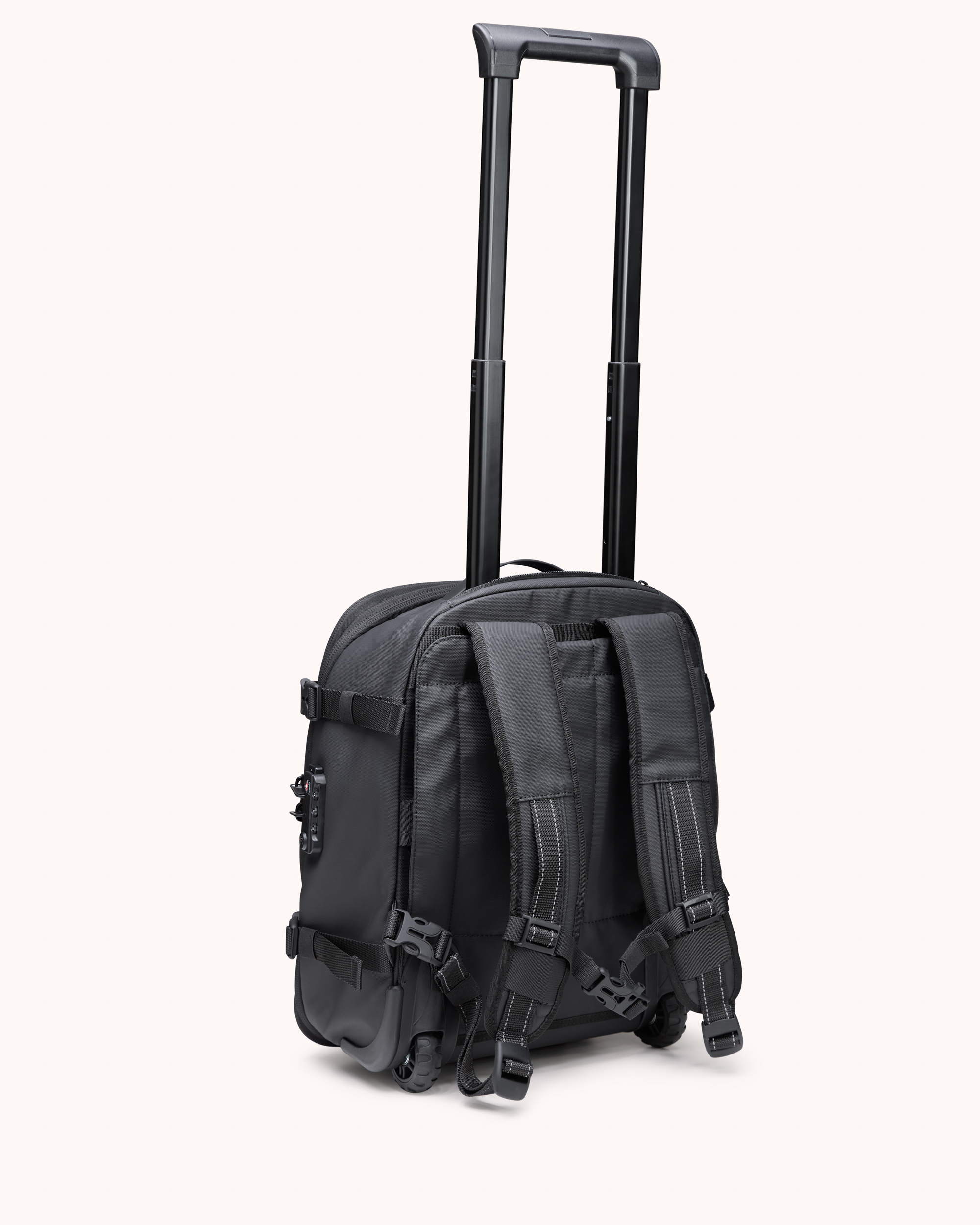 Black backpack with wheels and telescopic handle.
