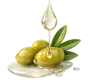 A drop of golden oil falls onto three green olives with leaves against a white background.