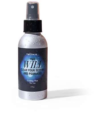 A silver spray bottle of 'This Will Clear Your Eczema and Psoriasis' cooling mist with water droplets on it.