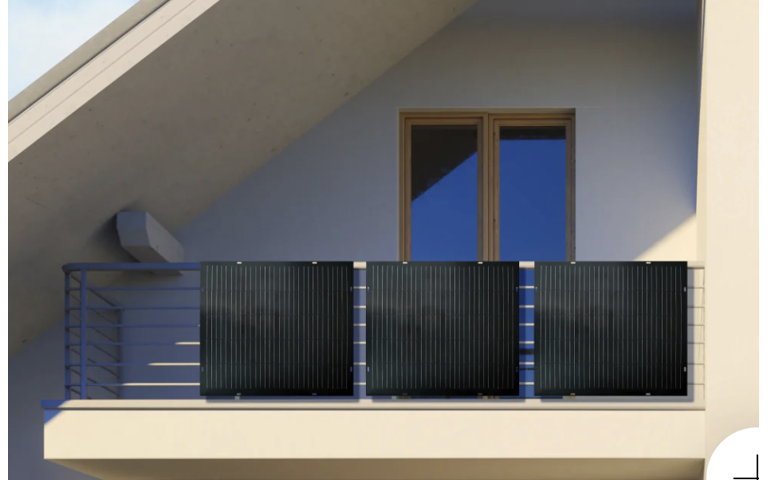 Balcony with three solar panels mounted on the railing.
