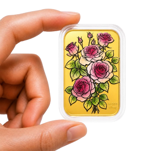 A hand holding a small gold bar in a plastic case, decorated with an illustration of pink roses.