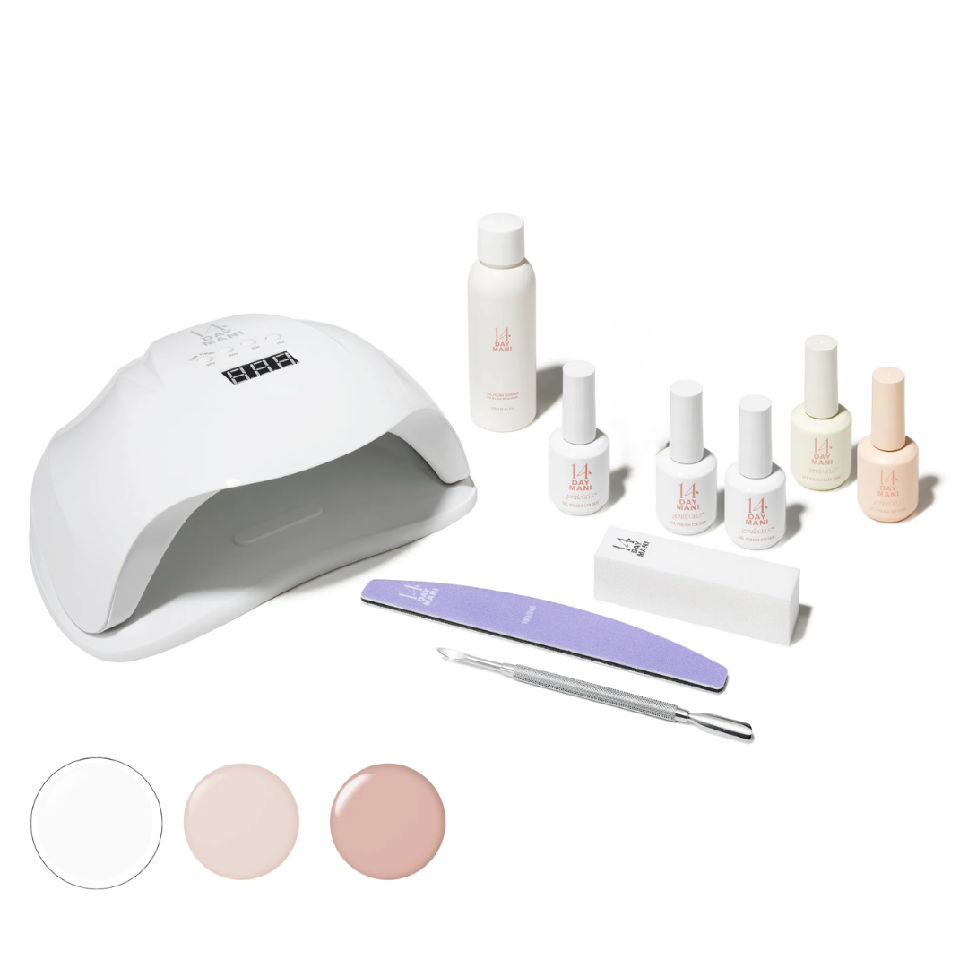 A gel manicure kit with a UV lamp, several bottles of polish, a nail file, and other tools.