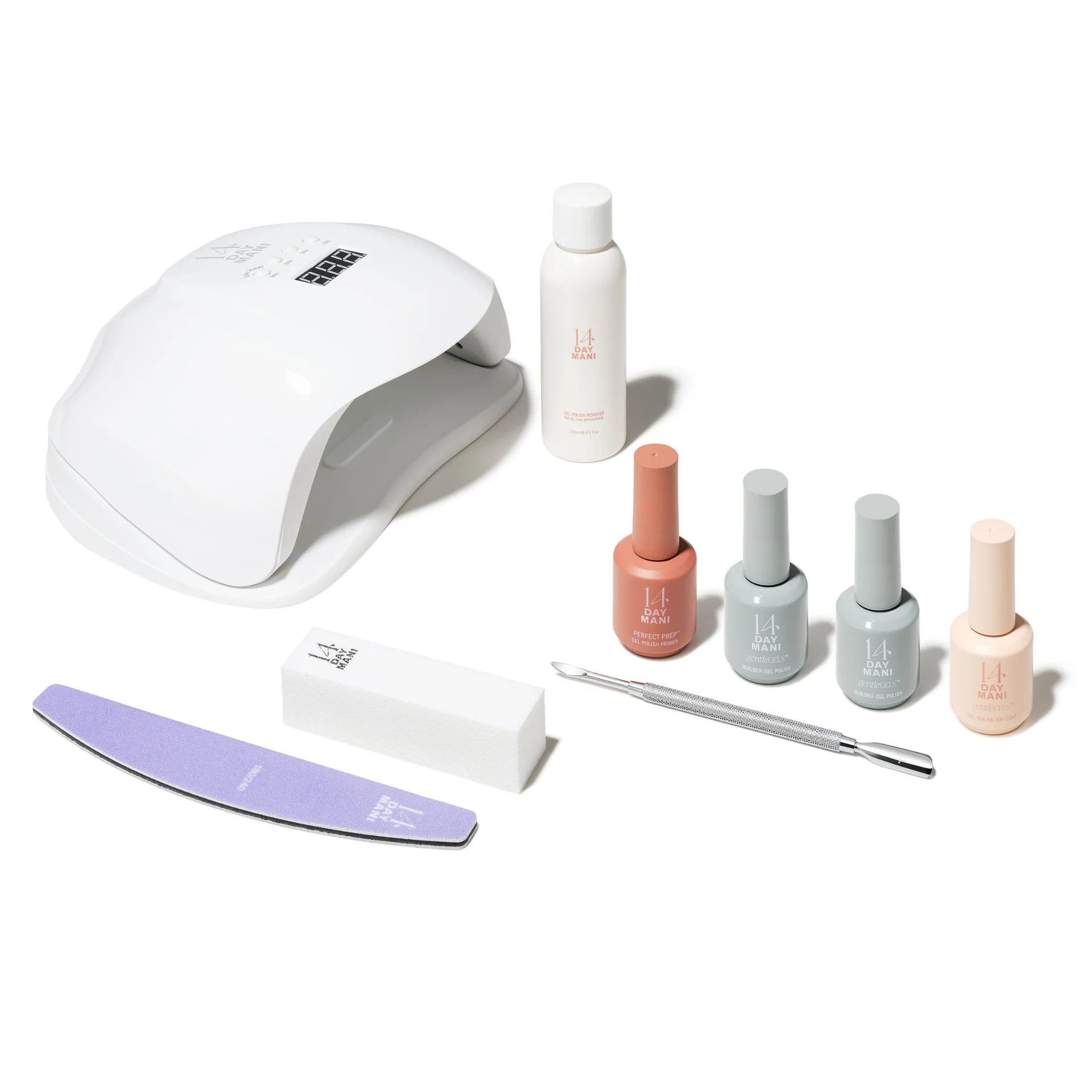 An at-home gel manicure kit with a UV lamp, nail polishes, and tools on a white background.