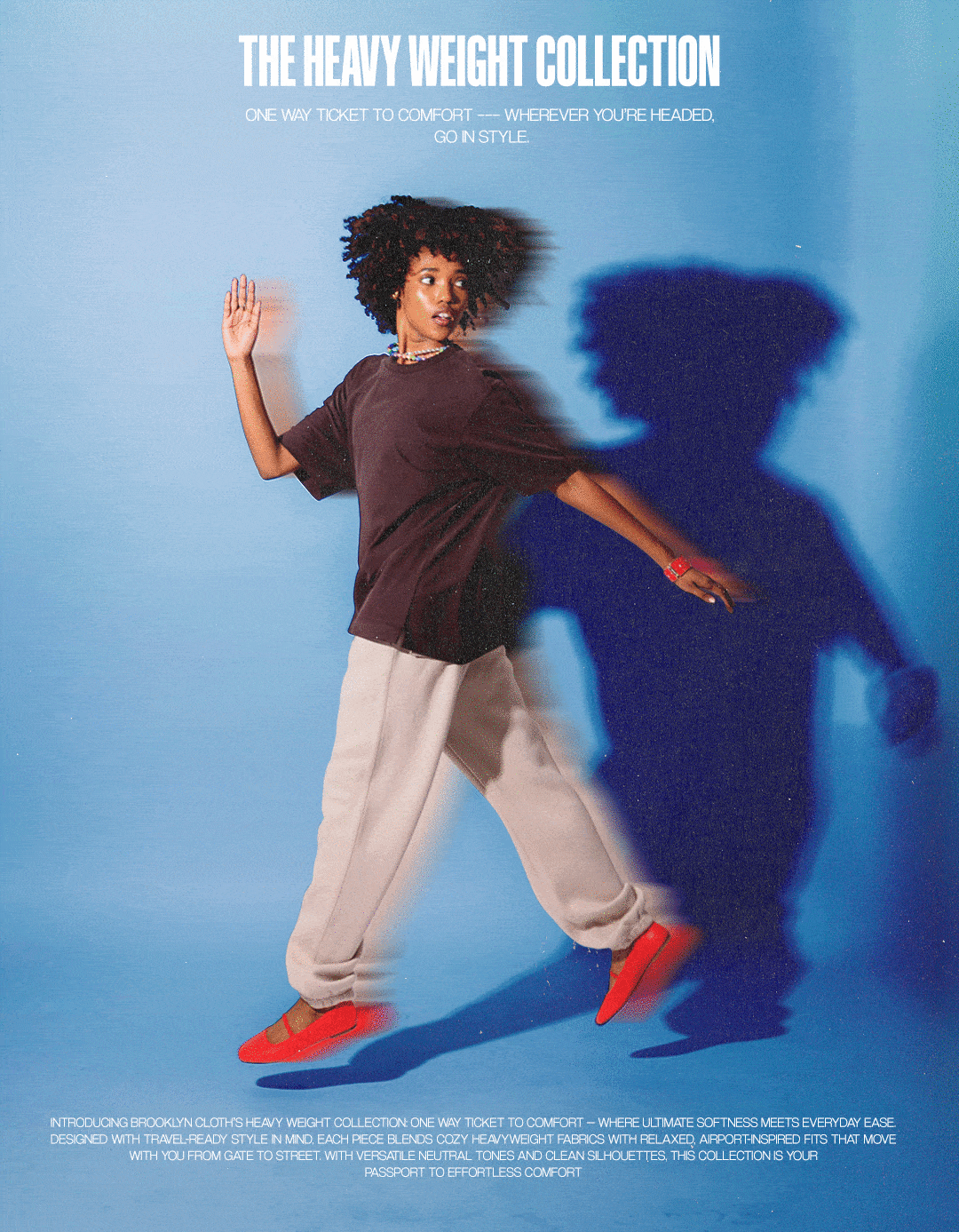 Person posing in casual clothing against a blue background with text overlay.