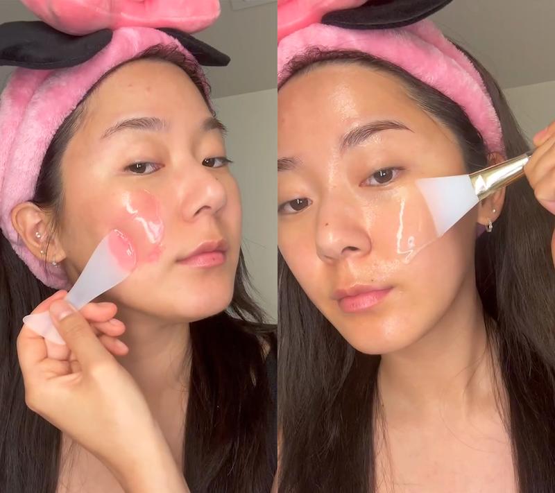 Woman applying skincare product with a brush and spatula.