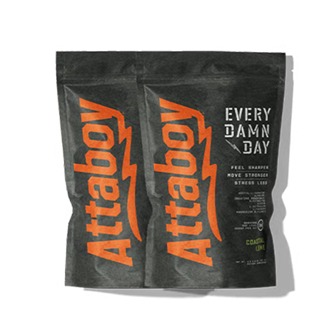 Two black bags with 'Attaboy' and 'Every Damn Day' written in orange and white.