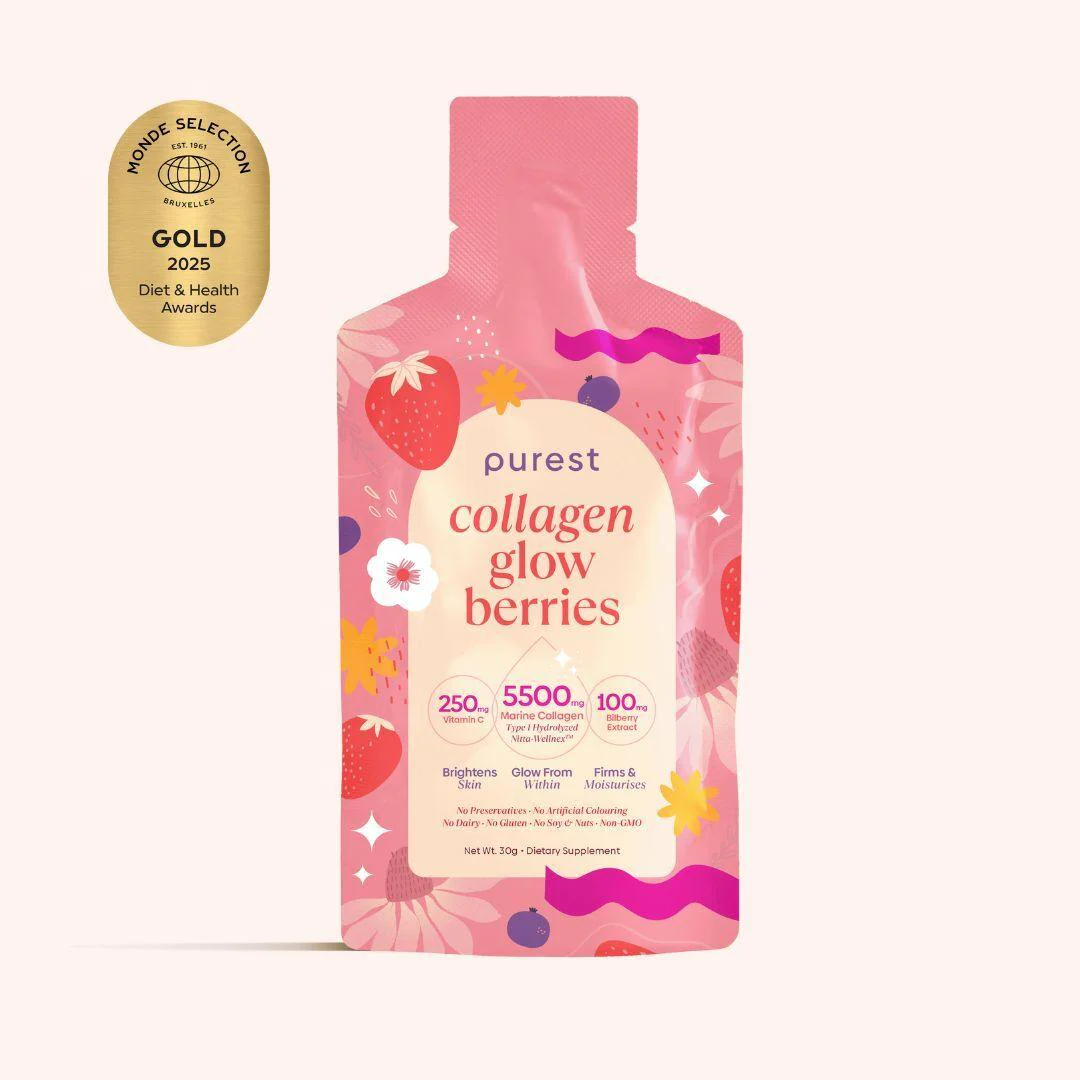 Pink pouch of 'collagen glow berries' with gold award badge on the side.