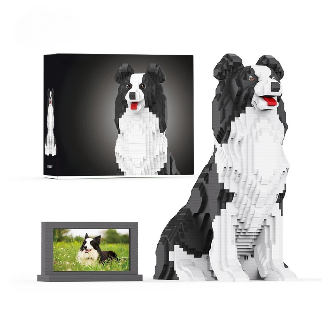Lego-style model of a black and white dog with packaging and photo display.