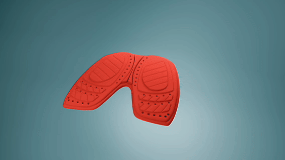 Red padded protective gear on a blue background.
