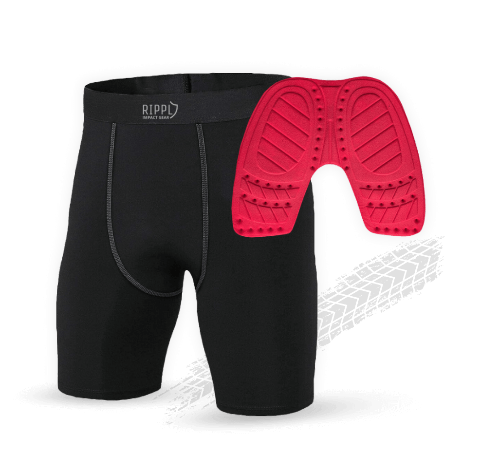 Black padded cycling shorts with a red detachable pad.