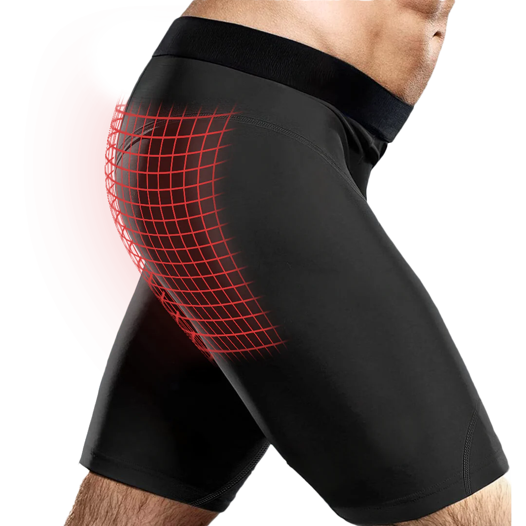 Man wearing black compression shorts with red grid pattern on the side.