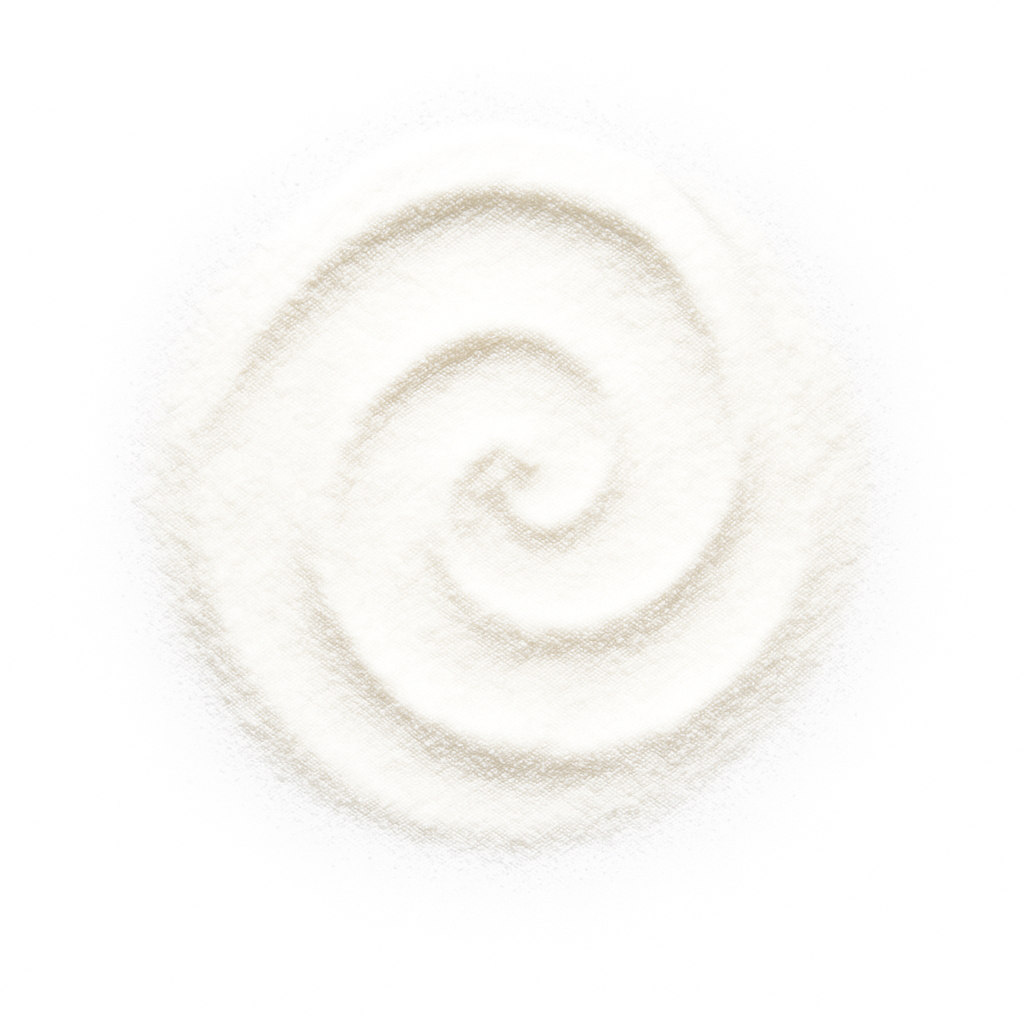 A spiral pattern drawn in fine white powder on a flat surface.