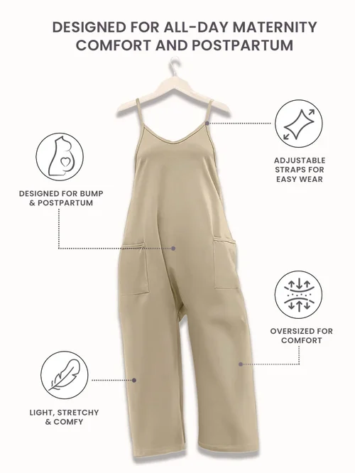 Beige maternity jumpsuit with adjustable straps and pockets, designed for comfort and postpartum wear.