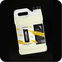 A one-gallon jug of Legendary Ceramic Shine, a light yellow liquid, on a black background.