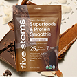 Brown smoothie packet labeled 'Superfoods & Protein Smoothie' surrounded by chocolate pieces.