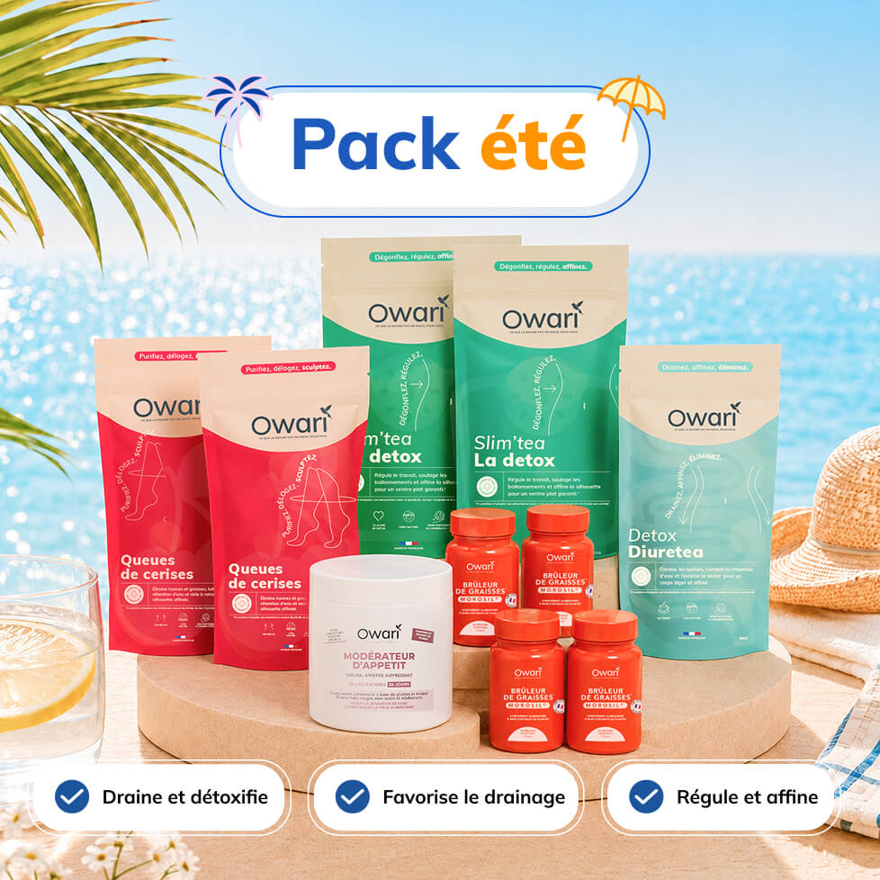 A collection of Owari brand summer detox and wellness products displayed on a beach setting.