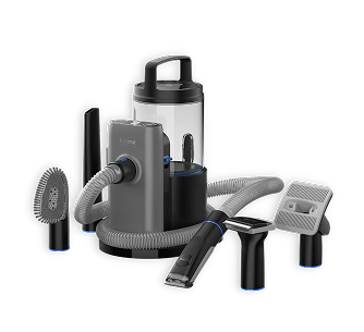 Vacuum cleaner with various attachments on a black background.