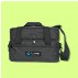 Black shoulder bag with a logo on a light green background.