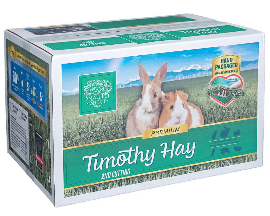 A cardboard box of Small Pet Select Timothy Hay, with a rabbit and guinea pig on the front.