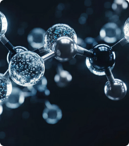 A close-up digital rendering of a molecular structure with clear, bubbly spheres and solid metallic spheres.