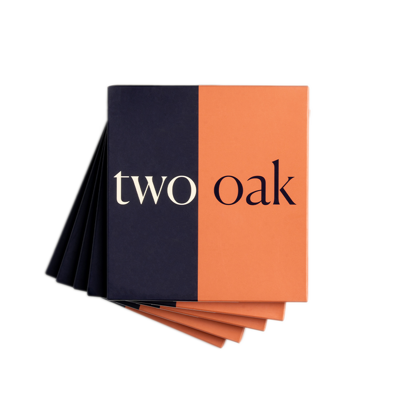 A fanned-out stack of small square booklets with blue and orange covers that read 'two oak.'