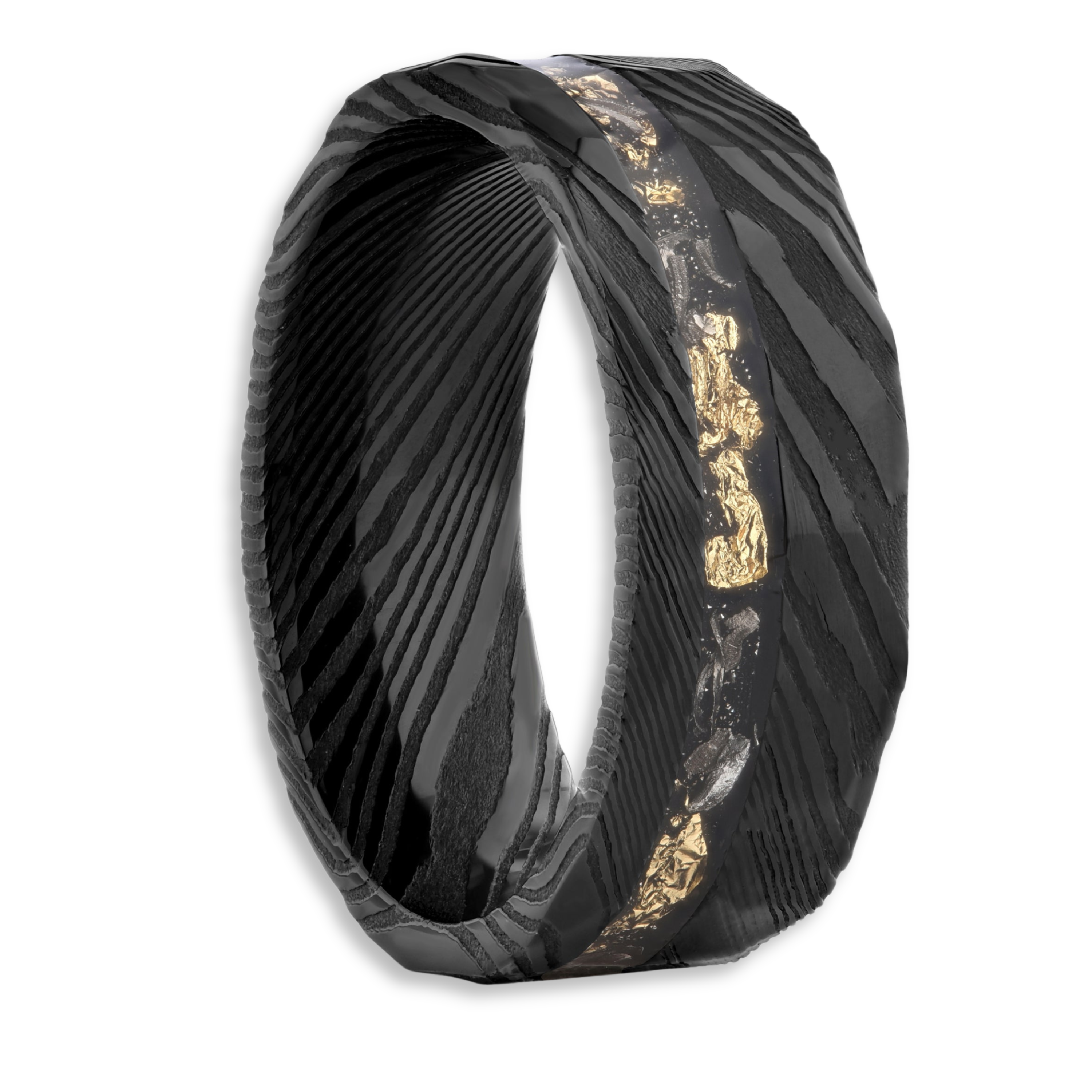 A textured black ring with a gold inlay design on a black background.