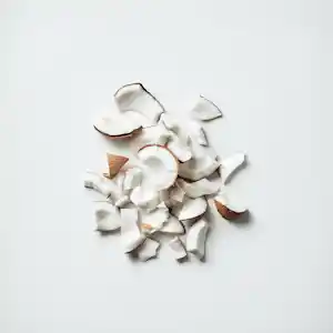 Pile of coconut pieces on a white background.