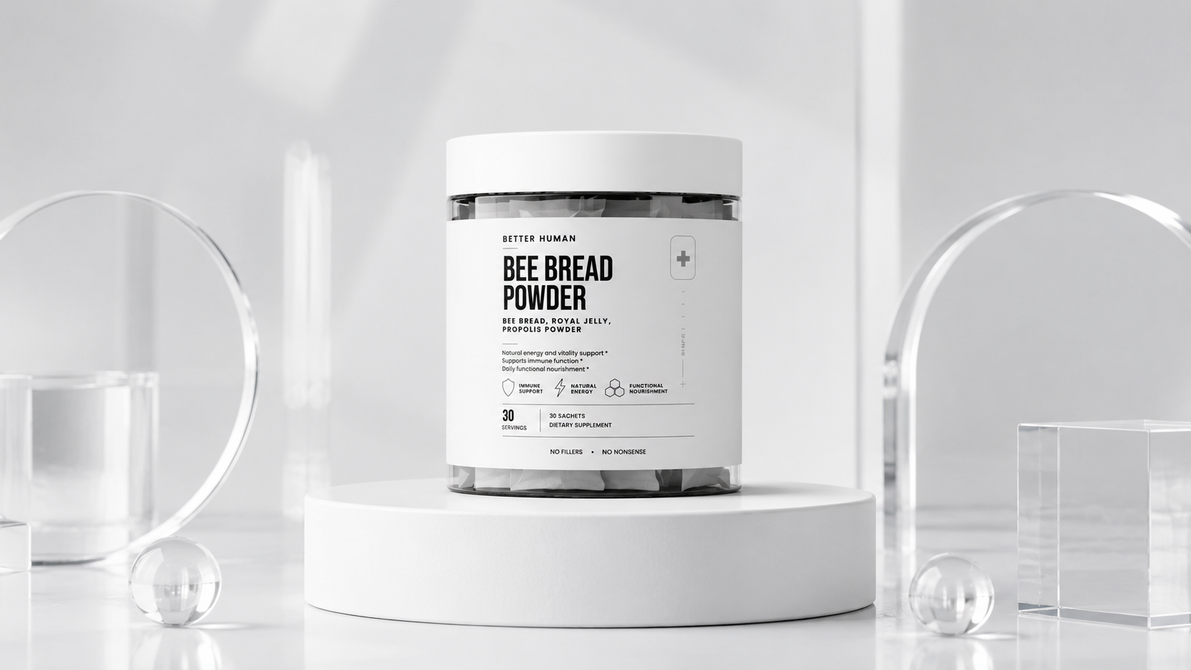 A jar of Better Human Bee Bread Powder sits on a white pedestal with decorative glass shapes.