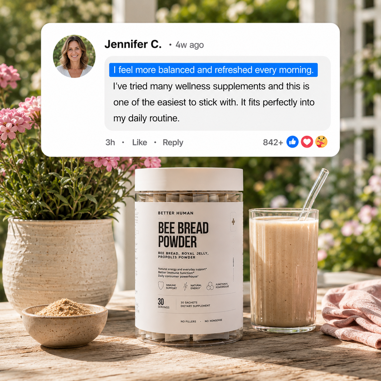 A jar of Better Human Bee Bread Powder on a table with a drink and a customer testimonial.